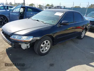 2001 Honda Accord EX z VIN JHMCG66861C018784, wystawiony jako IAAI lot #42405898 z przebiegiem 260 816 mil mil oraz . Historia ofert i sprzedaży dostępna na DreamBid. Obrazek 2.