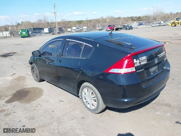 2010 Honda Insight LX with VIN JHMZE2H51AS022064, listed as a IAAI auction lot 41893433 with 263,542 mi miles. Bid and sale history available at carsss.com. Image 3.