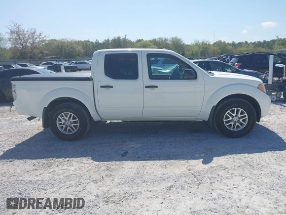 2015 Nissan Frontier SV with VIN 1N6AD0ER0FN746599, listed as a IAAI auction lot 41944073 with 63,347 mi miles and . Bid and sale history available at DreamBid. Image 14.