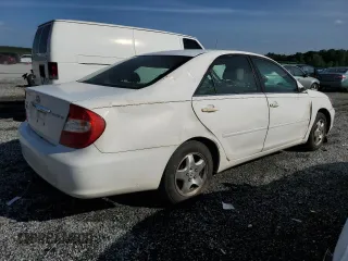 2002 Toyota Camry LE z VIN 4T1BE32K12U055722, wystawiony jako Copart lot #56522495 z przebiegiem 256 565 mil mil oraz Szkoda całkowita • Salvage title. Historia ofert i sprzedaży dostępna na DreamBid. Obrazek 3.