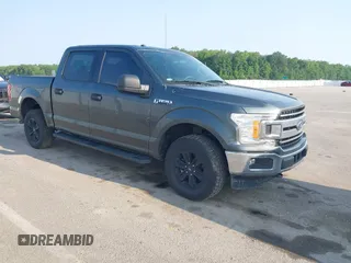 2018 Ford F-150 XL z VIN 1FTEW1EG4JKD85682, wystawiony jako IAAI lot #42390814 z przebiegiem 153 559 mil mil oraz . Historia ofert i sprzedaży dostępna na DreamBid. Obrazek 1.