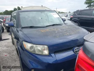 2014 Scion xB with VIN JTLZE4FE0EJ057503, listed as a IAAI auction lot 41994777 with 197,184 mi miles. Bid and sale history available at carsss.com. Image 1.