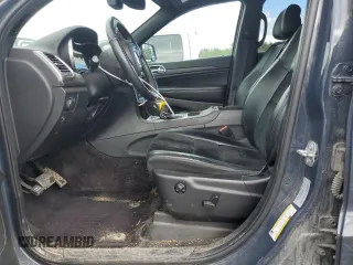 2017 Jeep Grand Cherokee Altitude z VIN 1C4RJFAG9HC786670, wystawiony jako Copart lot #58007254 z przebiegiem 117 638 mil mil oraz Szkoda całkowita • Salvage title. Historia ofert i sprzedaży dostępna na DreamBid. Obrazek 7.