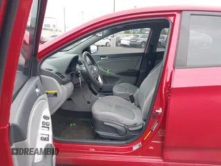 2015 Hyundai Accent GLS with VIN KMHCT4AE4FU827177, listed as a IAAI auction lot 42057967 with 83,842 mi miles and . Bid and sale history available at carsss.com. Image 5.