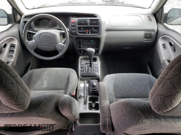 2003 Chevrolet Tracker ZR2 z VIN 2CNBJ734936905776, wystawiony jako Copart lot #48195115 z przebiegiem 133 770 mil mil oraz Szkoda całkowita • Salvage title. Historia ofert i sprzedaży dostępna na DreamBid. Obrazek 8.