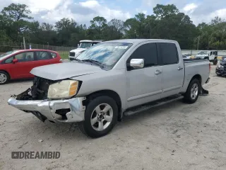 2004 Nissan Titan SE with VIN 1N6AA07AX4N560839, listed as a Copart auction lot 78515294 with 201,134 mi miles and Salvage title. Bid and sale history available at DreamBid. Image 1.