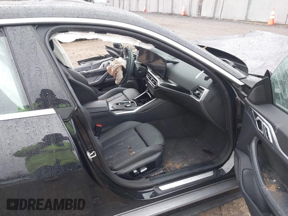 2023 BMW i4 eDrive35 z VIN WBY43AW03PFP82824, wystawiony jako IAAI lot #41468805 z przebiegiem 9 mil mil oraz . Historia ofert i sprzedaży dostępna na DreamBid. Obrazek 5.