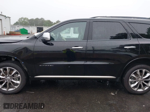 2023 Dodge Durango Citadel with VIN 1C4RDJEG1PC582304, listed as a IAAI auction lot 42528327 with 9,896 mi miles and . Bid and sale history available at DreamBid. Image 15.