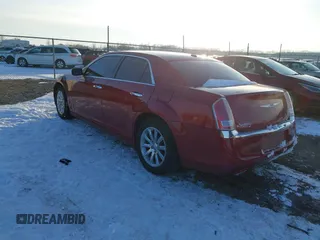 2012 Chrysler 300 Limited with VIN 2C3CCACG0CH205728, listed as a IAAI auction lot 41285693 with 125,204 mi miles. Bid and sale history available at carsss.com. Image 3.