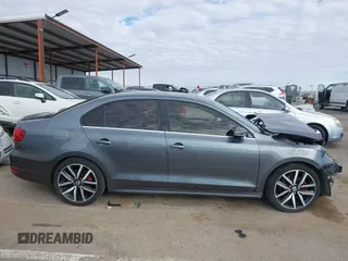 2013 Volkswagen Jetta GLI Autobahn with VIN 3VW467AJ7DM235818, listed as a IAAI auction lot 41061837 with 157,507 mi miles and . Bid and sale history available at DreamBid. Image 14.