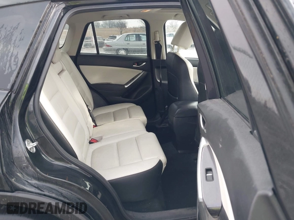2016 Mazda CX-5 Grand Touring with VIN JM3KE4DY3G0769448, listed as a IAAI auction lot 41947725 with 154,051 mi miles and . Bid and sale history available at carsss.com. Image 8.