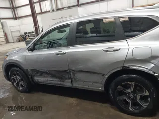 2017 Honda CR-V Touring with VIN 2HKRW2H90HH603307, listed as a IAAI auction lot 41868564 with 81,144 mi miles. Bid and sale history available at carsss.com. Image 14.