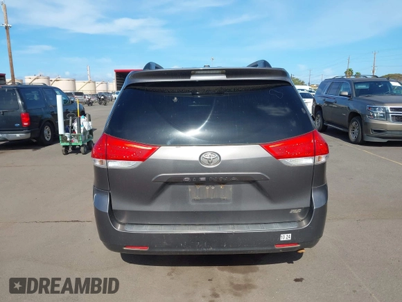 2014 Toyota Sienna XLE with VIN 5TDYK3DC2ES438980, listed as a IAAI auction lot 42067750 with 143,728 mi miles and . Bid and sale history available at DreamBid. Image 16.