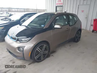 2014 BMW i3 with VIN WBY1Z4C57EV276127, listed as a IAAI auction lot 41531408 with 105,696 mi miles and . Bid and sale history available at DreamBid. Image 2.
