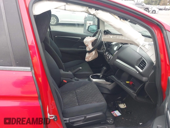 2015 Honda Fit LX with VIN 3HGGK5H5XFM775385, listed as a IAAI auction lot 42555319 with 81,615 mi miles and . Bid and sale history available at DreamBid. Image 5.