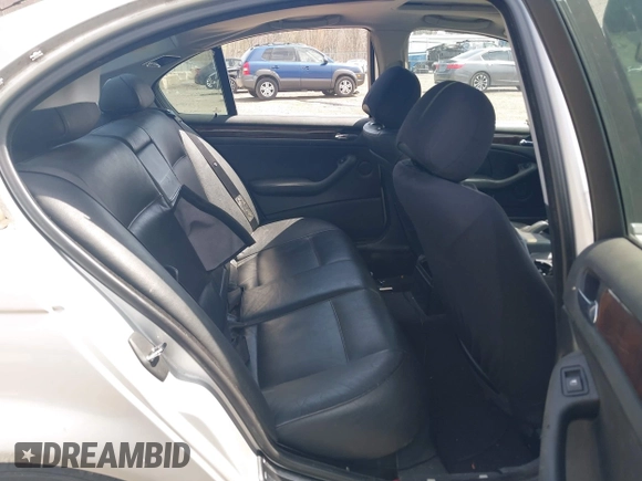 2003 BMW 3 Series 330i with VIN WBAEV53463KM25215, listed as a IAAI auction lot 42048348 with 107,271 mi miles. Bid and sale history available at carsss.com. Image 8.