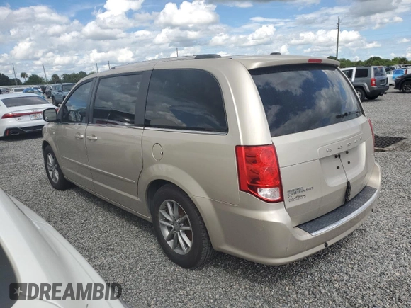 2014 Dodge Grand Caravan SXT 30th Anniversary with VIN 2C4RDGCG2ER328126, listed as a Copart auction lot 74277684 with Not Provided miles and Salvage Title. Bid and sale history available at DreamBid. Image 2.