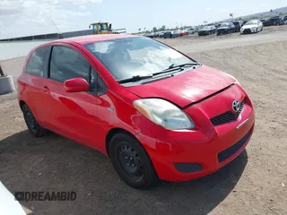 2010 Toyota Yaris with VIN JTDJT4K32A5318619, listed as a IAAI auction lot 41949602 with 134,614 mi miles. Bid and sale history available at carsss.com. Image 1.
