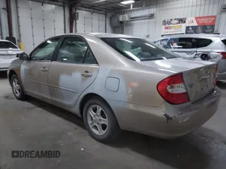 2004 Toyota Camry LE with VIN 4T1BE32K24U852256, listed as a IAAI auction lot 42036477 with 154,389 mi miles. Bid and sale history available at carsss.com. Image 3.