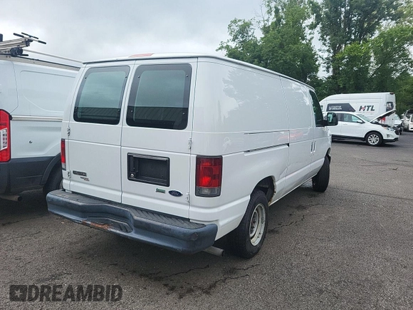 2013 Ford Econoline Cargo Commercial with VIN 1FTNE1EW3DDA61111, listed as a IAAI auction lot 42786321 with 199,373 mi miles and . Bid and sale history available at DreamBid. Image 3.