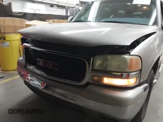 2004 GMC Yukon XL SLE with VIN 3GKEC16T14G149236, listed as a IAAI auction lot 41550083 with 165,759 mi miles. Bid and sale history available at carsss.com. Image 6.