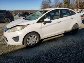2012 Ford Fiesta SE with VIN 3FADP4BJ3CM101275, listed as a Copart auction lot 85560904 with 101,169 mi miles and Salvage Title. Bid and sale history available at DreamBid. Image 1.