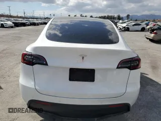 2022 Tesla Model Y Long Range z VIN 7SAYGDEE9NF434908, wystawiony jako Copart lot #56733235 z przebiegiem 38 178 mil mil oraz Szkoda całkowita • Salvage title. Historia ofert i sprzedaży dostępna na DreamBid. Obrazek 6.