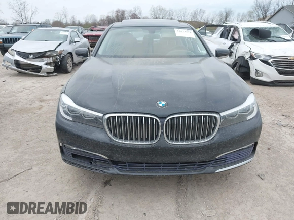 2017 BMW 7 Series 740i xDrive z VIN WBA7E4C55HGU99165, wystawiony jako IAAI lot #42073278 z przebiegiem 47 506 mil mil oraz . Historia ofert i sprzedaży dostępna na DreamBid. Obrazek 12.