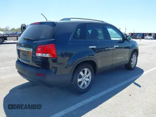 2013 Kia Sorento LX with VIN 5XYKTCA6XDG345234, listed as a IAAI auction lot 42047737 with 138,496 mi miles. Bid and sale history available at carsss.com. Image 4.