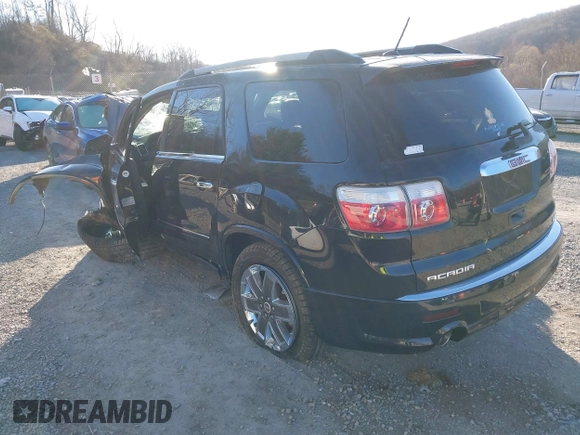 2011 GMC Acadia Denali with VIN 1GKKVTED7BJ327908, listed as a IAAI auction lot 41879070 with 62,591 mi miles. Bid and sale history available at carsss.com. Image 3.