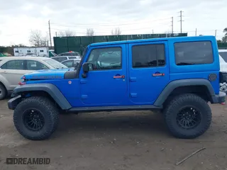 2016 Jeep Wrangler Unlimited Rubicon with VIN 1C4BJWFG2GL192074, listed as a IAAI auction lot 41598861 with 70,000 mi miles. Bid and sale history available at carsss.com. Image 14.