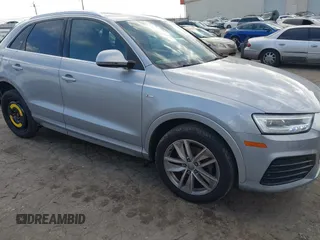 2018 Audi Q3 Premium Plus with VIN WA1JCCFS0JR023016, listed as a IAAI auction lot 41591930 with 102,672 mi miles. Bid and sale history available at carsss.com. Image 1.