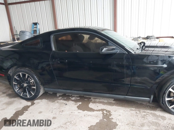 2012 Ford Mustang V6 Premium with VIN 1ZVBP8AM5C5223787, listed as a IAAI auction lot 42141944 with 73,960 mi miles. Bid and sale history available at carsss.com. Image 13.