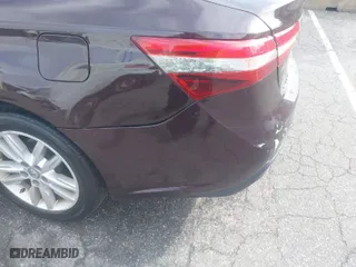 2014 Toyota Avalon Limited with VIN 4T1BK1EB2EU098415, listed as a IAAI auction lot 41747184 with 230,571 mi miles. Bid and sale history available at carsss.com. Image 6.