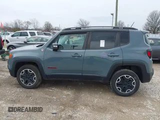 2015 Jeep Renegade Trailhawk z VIN ZACCJBCT4FPB79254, wystawiony jako IAAI lot #41965451 z przebiegiem 87 398 mil mil oraz . Historia ofert i sprzedaży dostępna na DreamBid. Obrazek 14.