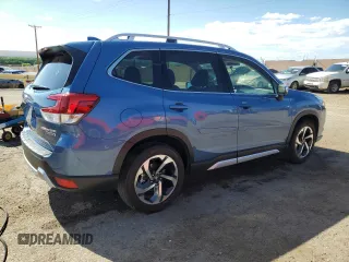 2023 Subaru Forester Touring z VIN JF2SKARC6PH502188, wystawiony jako Copart lot #56960245 z przebiegiem 10 487 mil mil oraz Szkoda całkowita • Salvage title. Historia ofert i sprzedaży dostępna na DreamBid. Obrazek 3.