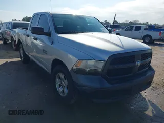 2014 Ram 1500 Tradesman with VIN 1C6RR6FG8ES314972, listed as a IAAI auction lot 41563554 with 233,285 mi miles and . Bid and sale history available at DreamBid. Image 1.