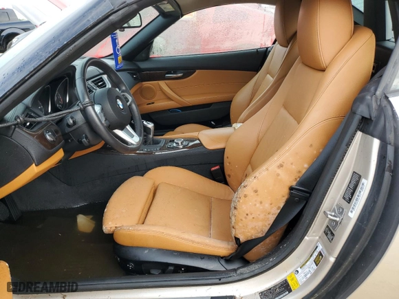 2012 BMW Z4 sDrive35i with VIN WBALM7C5XCE384505, listed as a Copart auction lot 74933904 with 0 mi miles and Salvage Title. Bid and sale history available at carsss.com. Image 7.