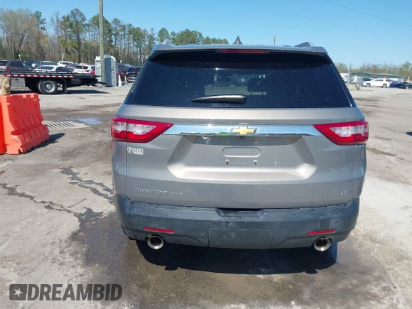 2018 Chevrolet Traverse LT Cloth z VIN 1GNEVGKW4JJ281837, wystawiony jako IAAI lot #41919081 z przebiegiem 91 496 mil mil oraz . Historia ofert i sprzedaży dostępna na DreamBid. Obrazek 16.