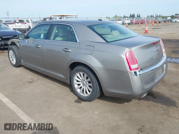 2014 Chrysler 300 with VIN 2C3CCAAG3EH322855, listed as a IAAI auction lot 42053129 with 172,687 mi miles. Bid and sale history available at carsss.com. Image 3.