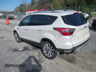 2017 Ford Escape Titanium with VIN 1FMCU9JD9HUB40135, listed as a IAAI auction lot 42054533 with 68,255 mi miles. Bid and sale history available at carsss.com. Image 3.