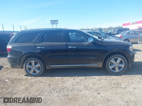 2013 Dodge Durango Citadel z VIN 1C4RDHEG2DC674736, wystawiony jako IAAI lot #40948649 z przebiegiem 75 461 mil mil oraz . Historia ofert i sprzedaży dostępna na DreamBid. Obrazek 13.