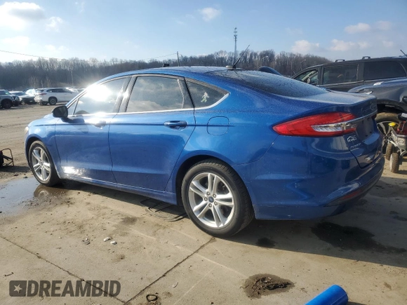 2018 Ford Fusion SE with VIN 3FA6P0H77JR188708, listed as a Copart auction lot 47030095 with 141,050 mi miles and Salvage Title. Bid and sale history available at DreamBid. Image 2.