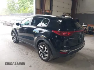 2021 Kia Sportage EX z VIN KNDPNCAC5M7886551, wystawiony jako IAAI lot #42645206 z przebiegiem 49 312 mil mil oraz . Historia ofert i sprzedaży dostępna na DreamBid. Obrazek 3.