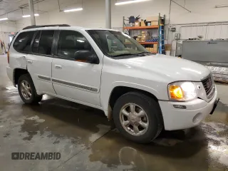 2002 GMC Envoy SLT with VIN 1GKDT13S822472292, listed as a Copart auction lot 52749785 with 172,211 mi miles and Salvage Title. Bid and sale history available at carsss.com. Image 4.
