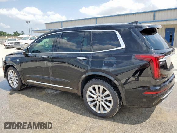 2020 Cadillac XT6 FWD Premium Luxury с VIN 1GYKPCRSXLZ104502, выставлен на аукционе Copart как лот 58211275 с пробегом 97 053 миль миль и Списание • Salvage title. История ставок и продаж доступна на DreamBid. Изображение 2.