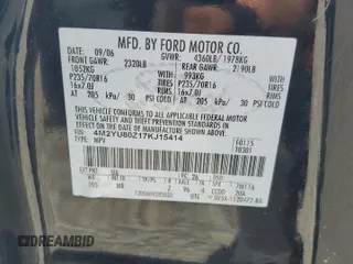 2007 Mercury Mariner Convenience z VIN 4M2YU80Z17KJ15414, wystawiony jako Copart lot #57556855 z przebiegiem 191 412 mil mil oraz Szkody całkowita. Historia ofert i sprzedaży dostępna na DreamBid. Obrazek 13.