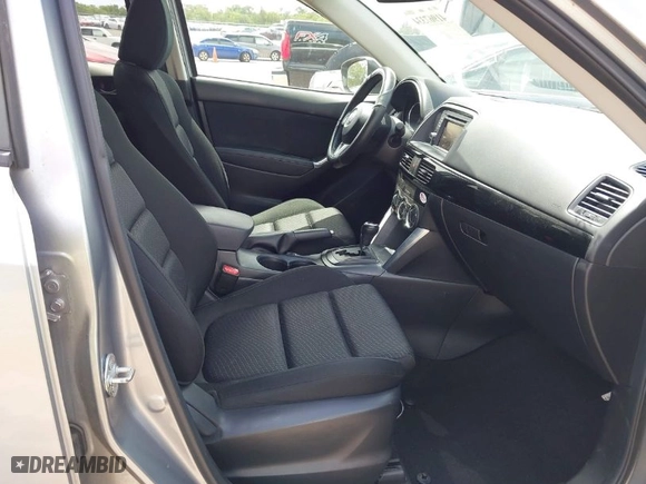 2014 Mazda CX-5 Touring with VIN JM3KE2CY4E0357445, listed as a IAAI auction lot 41967334 with 115,535 mi miles. Bid and sale history available at carsss.com. Image 5.
