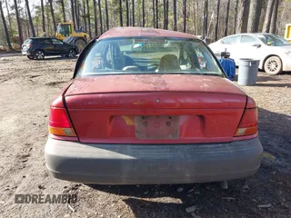 1997 Saturn SL with VIN 1G8ZF528XVZ325466, listed as a IAAI auction lot 41576703 with 237,089 mi miles. Bid and sale history available at carsss.com. Image 16.