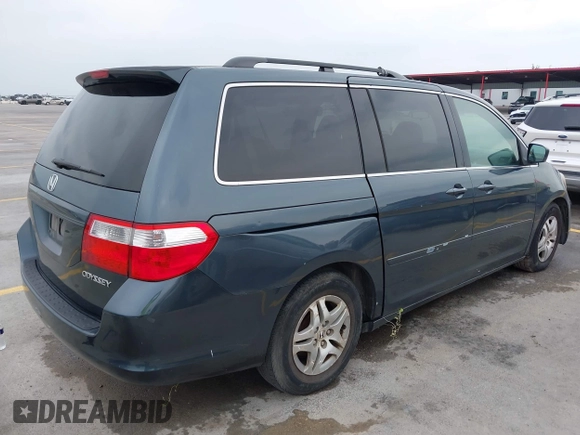 2005 Honda Odyssey EX-L with VIN 5FNRL38775B110232, listed as a IAAI auction lot 42301513 with 277,389 mi miles and . Bid and sale history available at DreamBid. Image 4.